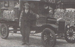 Albert Mew, founder of Mew The Movers, beside an early lorry in the 1920s